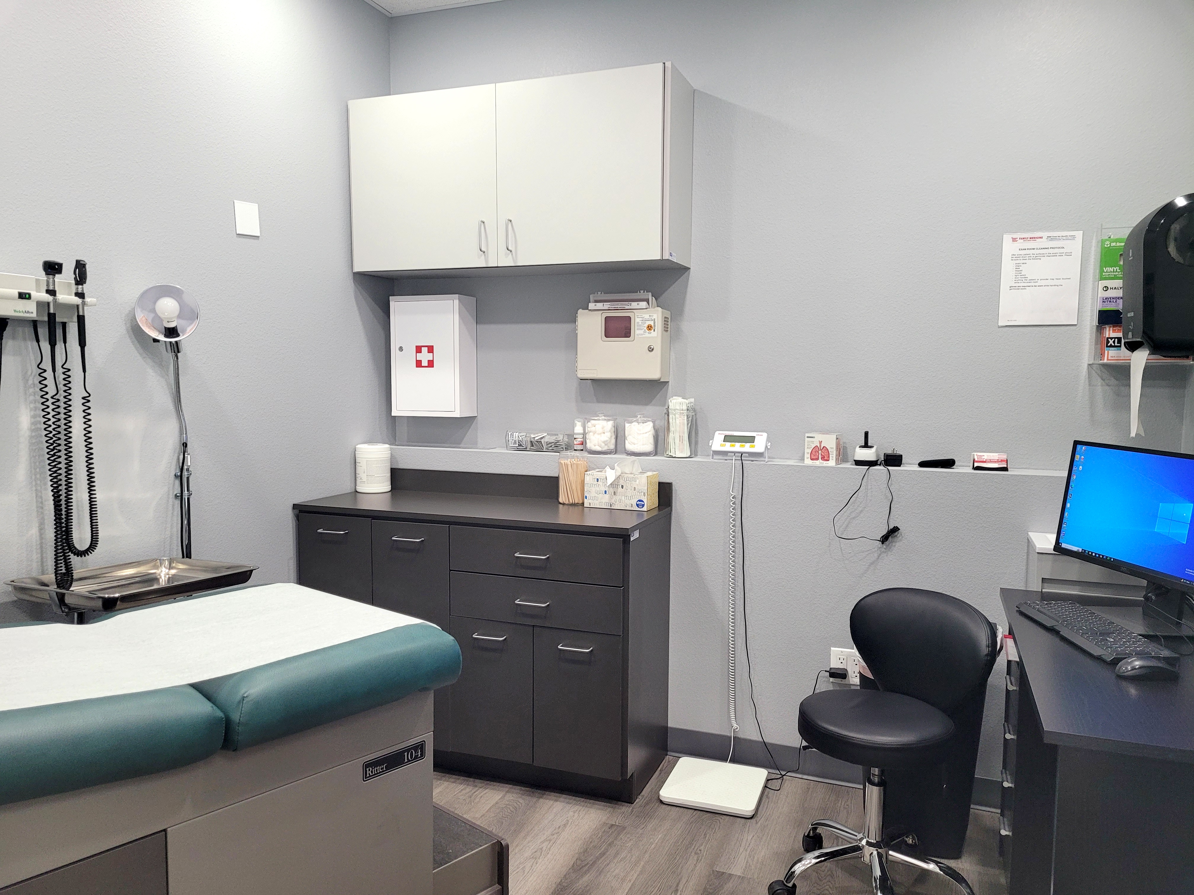 Clinic hallway and patient rooms